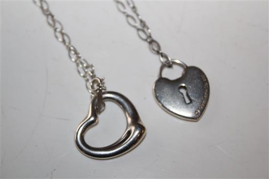 Tiffany & Co silver pendant designed by Elsa Peretti on a silver Tiffany & Co chain